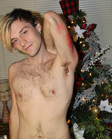 A Christmas Twink Unwraps His Package Under the Tree